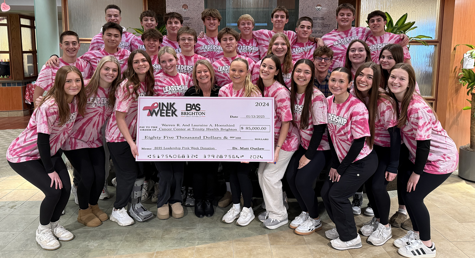 Brighton Students Posing with Large Check