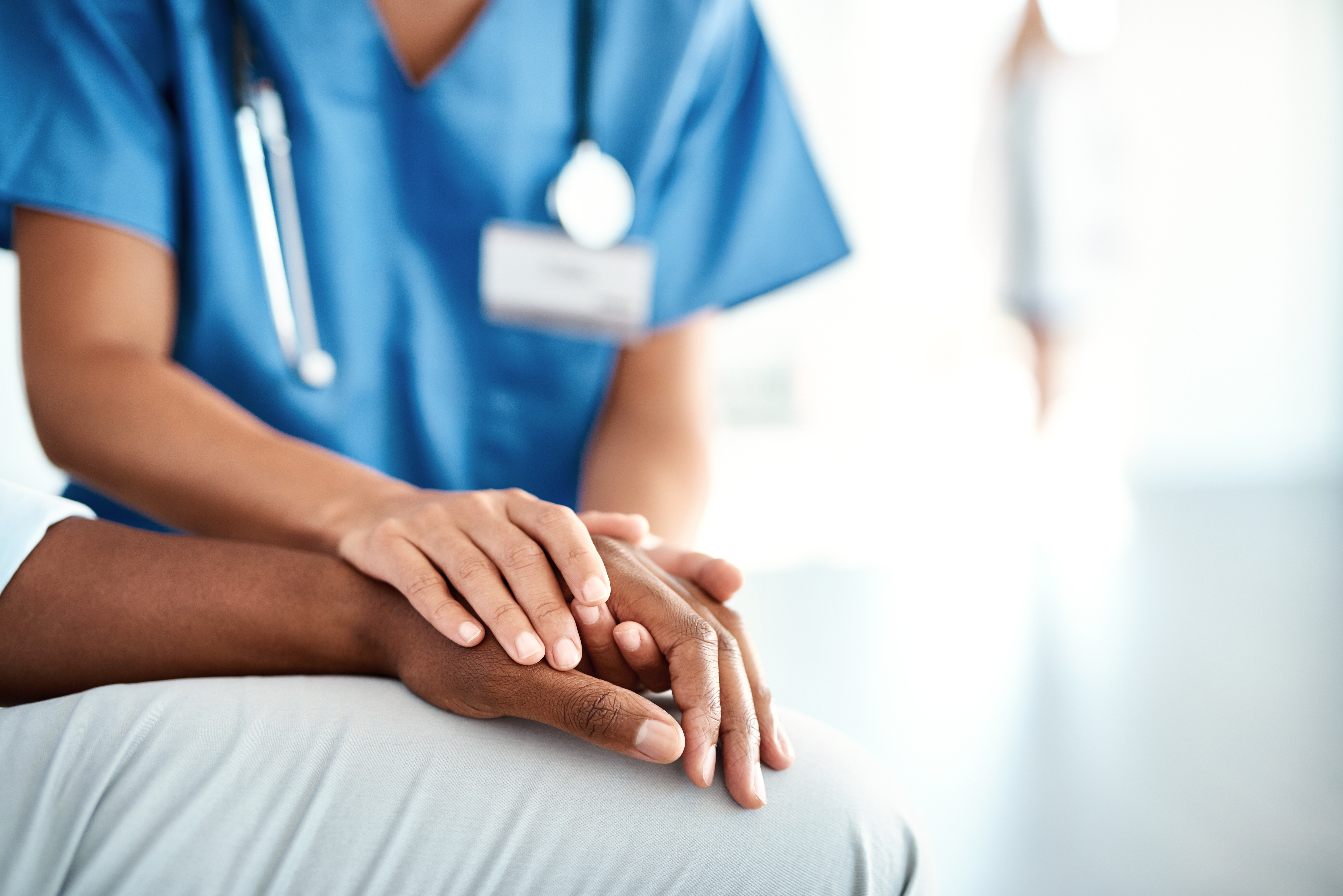 Doctor's hands and patient's hands
